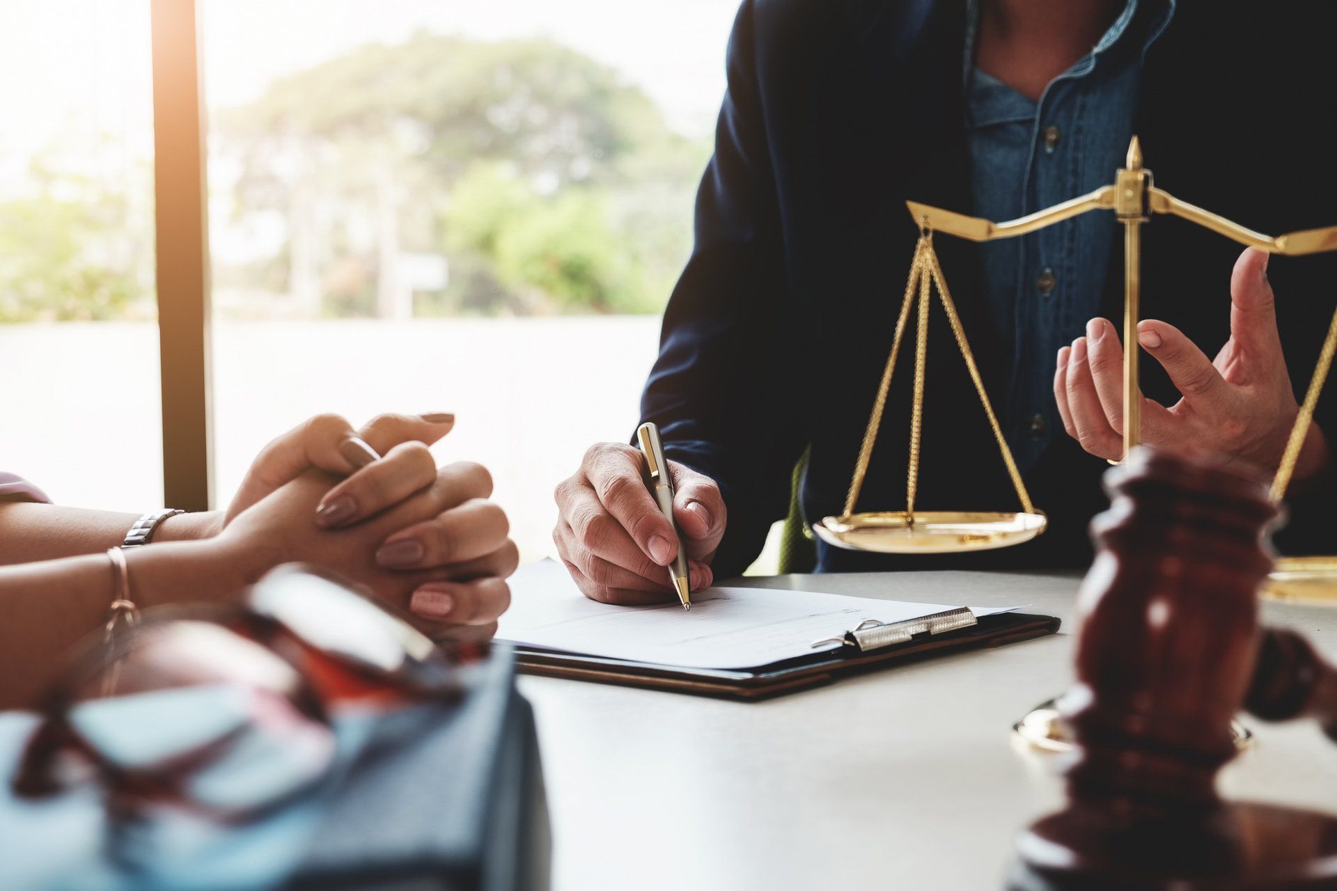 Senior personal injury solicitor reviewing a Birtinya compensation claim
